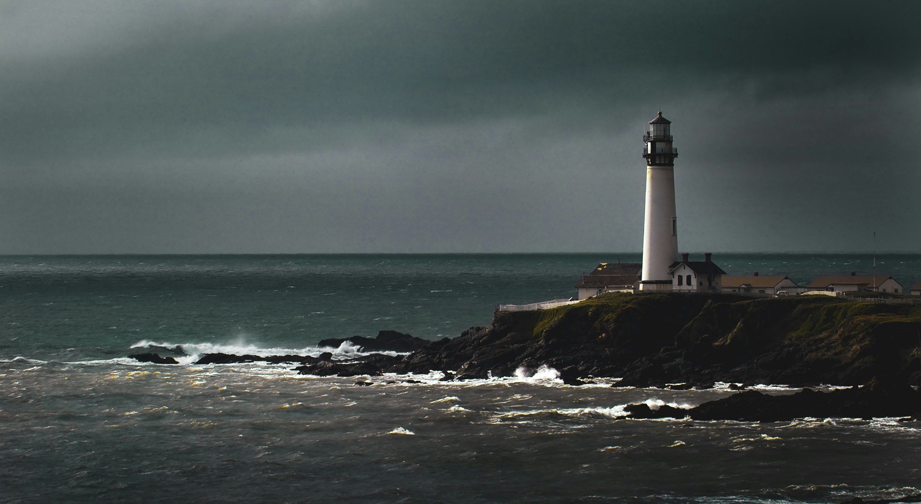 Lighthouse standing resolute through storm, a beacon for legacy wealth stewardship
